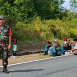 Babinsa Mengikuti dan Mengamankan Pelaksanaan Selamatan Kampong Desa Keciput 