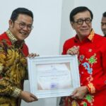 Bupati Basel Terima Penghargaan dari Menkumham RI